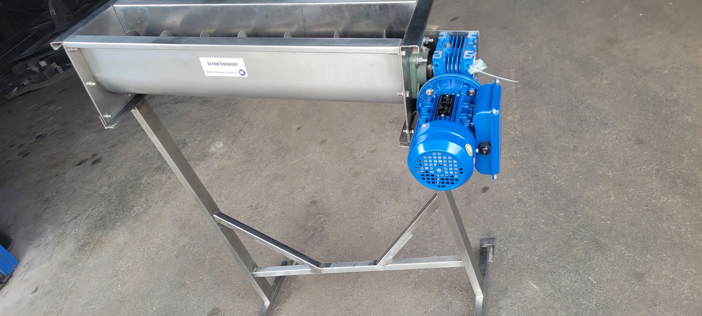 A stainless screw conveyor with its geared motor